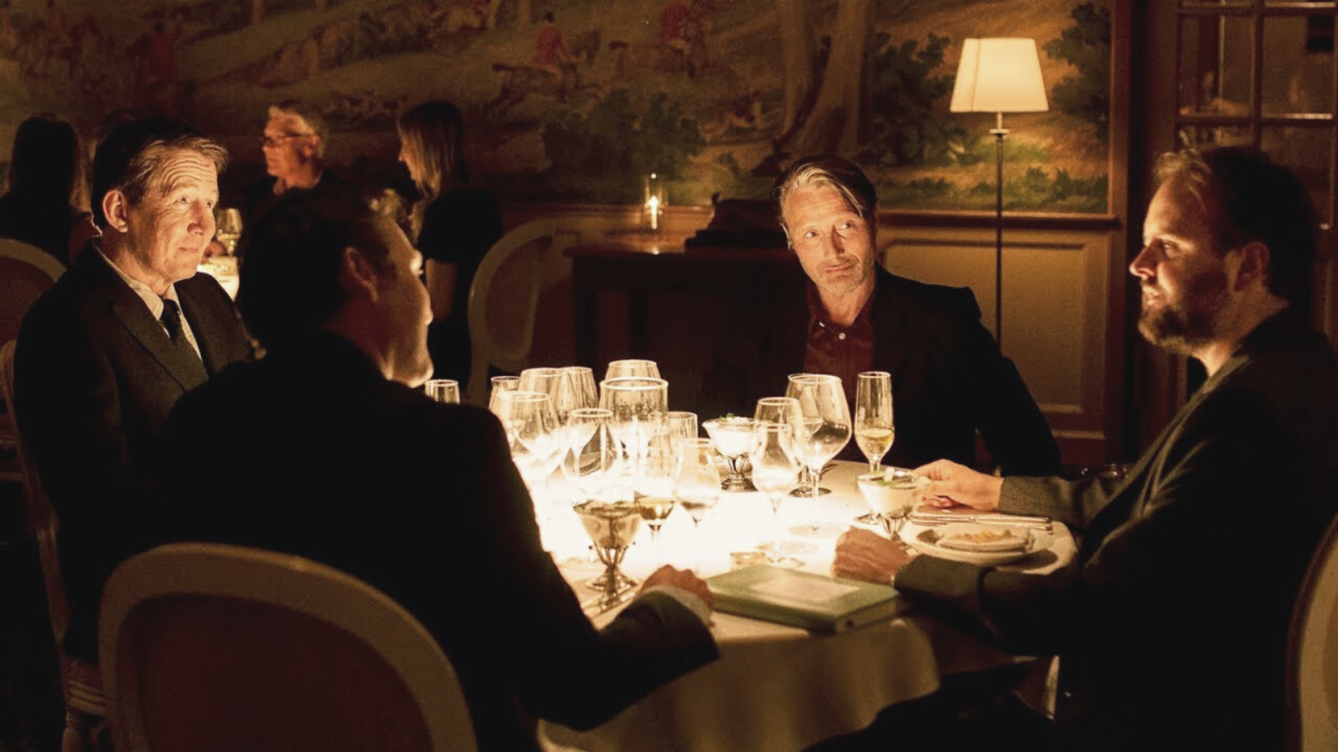 Another Round-the friends at dinner. With Thomas Bo Larsen as Tommy, Mads Mikkelsen as Martin, Magnus Millang as Nicolaj, and Lars Ranthe as Peter