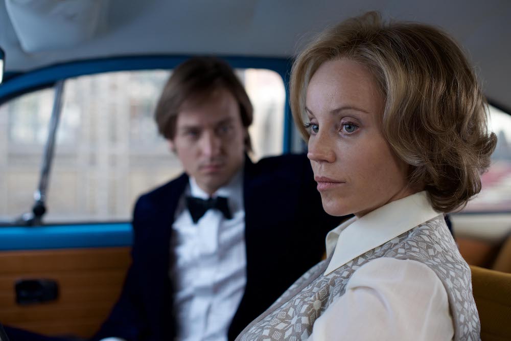 The Same Sky Scene of Tom Schilling as Lars Weber in the car with Sofia Helin as Laren Faber